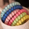 Cavo telefonico colorato Porta code di cavallo Gomma di buona qualità Corda elastica per capelli per ragazze Bracciale color caramella 18 colori