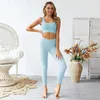 2020 NUEVO SET YOGA FUMINAS Mujeres sin fisuras Ropa deportiva Color sólido Sexy acolchado Cultivo de cultivos y pantalones de entrenamiento Ropa de entrenamiento para mujeres