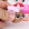 8pcs / Bag Wholesale 9cm Human Shape Suit High Quality Action Can Spray Water Lovely Silicone Big Eye Dolls Toys For Girls