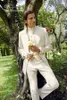 Nuevo esmoquin de novio con cuello levantado de marfil hecho a medida padrino de boda para hombre trajes de boda para novio (chaqueta + Pantalones + chaleco + corbata) 1498