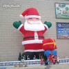 Scultura gigante gonfiabile personalizzata di Babbo Natale modello 3m/6m/10m per celebrare il giorno di Natale