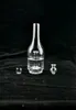 물 담뱃대 카르타 및 피크 유리 재활용 업체에는 투명한 연기 와인 병 모양의 컵이 장착되어 있습니다.