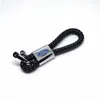 Fashoin Metall + Leder flechten Auto Keychain Schlüsselanhänger Schlüsselring-Schlüsselring für Ford Focus Mondeo Chaveiro Llavero Schlüsselhalter