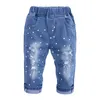 Completi di abbigliamento per bambina alla moda per bambini Top con spalle scoperte per bambini bianco + pantaloni in denim con foro Jean fascia per capelli 2 pezzi abito per bambini per bambini