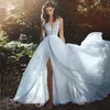 2018 Gorgeous Beach Wedding Dresses Sheer Neck Cap Sleeves Appliques Lace Chiffon Side Split Illusion Back Boho Wedding Gowns Bridal Dresses