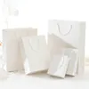 sap Düğün Favor Kağıt Hediyelik Çanta Fabrikası toptan LX2571 ile 5 Boyut Yüksek kaliteli Beyaz kraft torba
