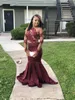 Sheer Illusion Długie rękawy Mermaid Burgundia Prom Dresses Long 2019 Open Back Lace Aplikacje Seksowne Afryki Czarne Dziewczyny Formalne Suknie Party