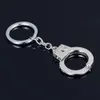 100pcslot Fashion Metal Handcuff Keychains Mini Handcuff Shaped Keyrings Key 2020New69780243374842