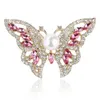 Broche de mariposa encantador con diamantes de imitación de cristal de alta calidad para mujer, accesorios de joyería de boda, broche de insecto de Color dorado elegante para mujer