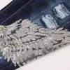 Fashion-Sequin Mens Jeans Male Eagle Wings Embroidery Stitching Sequins Hole Jeans Slim Pants Ribbed Mens Robin Jeans259N