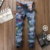 Mens Designer Furo rasgado azul animal Jeans Moda Bordados Denim Trousers alta qualidade Primavera Outono Zip jeans reta