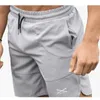 Été nouveau Short de course à séchage rapide hommes respirant Jogging Fitness Shorts Tennis hommes Gym Shorts Sport entraînement pantalons courts Leggings