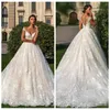 Abiti da sposa da giardino con applicazioni di pizzo a-line a maniche corte trasparenti 2019 Abiti da sposa lunghi formali con cappella treno Abiti trasparenti personalizzati