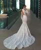 Vintage Lace Mermaid Kleider Rückenfreie Hochkragen Sweep -Zuggarten Hochzeitskleider Langarmes Vestido de Novia