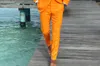 2019 Neueste Mantelhosen Designs Männer Orange Anzüge Hochzeitsanzug Kleider Slim Fit Bräutigam Männer Männlicher Smoking 2 Stück WL2679714