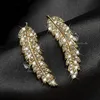 2019 وصول جديد مجوهرات فاخرة 925 الجنيه الفضي الفضة الأبيض من الياقوت أبيض CZ Diamond Leaf Feather Studring for Women GI673589