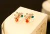 Wyprzedaż moda luksusowy projektant kolorowy kryształowy kwiat diament cyrkon pearl super błyszczący stadniny kolczyki dla kobiety srebrny szpilka