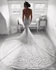 Robes de mariée sirène élégantes Illusion boutons couverts dos dentelle appliques chapelle train sur mesure robe de mariée vestido de novia