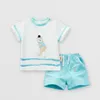 Promotion Child Koreansk version av män och kvinnor Barnkläder Set sommar baby kläder bomull kortärmad t-shirt och shorts