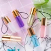 Mini 5ml Travel Pot Portable Empty Refillable Glass Sample Roll on Bottle with Pendant For Essential Oil Liquid Perfume LX7548