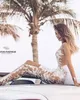 Designer 2020 Jumpsuits Bröllopsklänningar med avtagbar kjol Lace Illusion Neck Bridal Gowns Långärmad Robe de Mariée