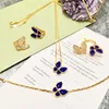 Wholesale- hot-selling copper-plated gold jewelry Trifolium Lapis diamond double butterfly open ring with gift box