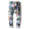 Partihandel-europeisk gata stil mode casual graffiti tryckta jeans raka smala män sträcka casual smal denim byxor storlek 29-38