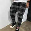 Брюки к клетку Мужчины Jogger Hip Hop Cotwear Мужские хип-хоп штаны мужские брюки карманные эластичные XXXL спортивные штаны мужские брюки