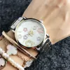 Moda Zegarki Marka Damskie Dziewczyny Kwiat Styl Metalowa Stal Zespół Kwarcowy Wrist Watch T139