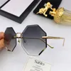 Großhandels-neue Modedesigner-Sonnenbrille 0376 rahmenloser Polygonrahmen mit Kristallschneidelinse, beliebter Stil, Top-Qualität