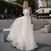 Elegant A Line Lace Bröllopsklänningar Spaghetti Straps Appliqued Bridal Gowns Tulle Sweep Train Corset Robe de Mariée