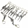 Whole 50pcs Lot Game Gun Model Key Chain Metal Alloy Key Rings Keys Holders Size 6cm Blister Card Package Key Chains242d