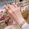 Bracciale con ciondolo punk di qualità lussuosa che non cambia colore e con diamanti scintillanti in oro rosa 18 carati e platino PS2015