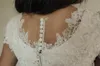 Beaded Lace Modest Wedding Dresses Cap Sleeves Juvel Neck Knappar Tillbaka Korta Ärmar A-Line Bridal Gowns LDS Informell Bröllopsklänning