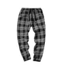 Męskie spodnie wszechstronne łatwe Harajuku Plaid dla kobiet Spodnie 2021 Streetwear Kobieta Harem Jesienne Damskie Causal Plus Size1