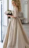 2020 New Vintage Lace Stain Champagne Abiti da sposa Mezza manica Sheer Collo coperto Botton economici Dubai Arabo Abito da sposa Foto reali 747