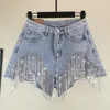 2019 Summer Heavy Rhinestone fransed hål Denim Kvinnlig hög midja cowboy -shorts tofsar brett ben