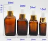 Bouteille d'huile essentielle en verre ambré et flacons compte-gouttes carrés liquides 10 ml 20 ml 30 ml bouchons de type multiple