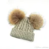 子供の冬の帽子の冬の帽子の冬の帽子の少年女の子の自然な毛皮のボールビーニー子供の帽子の二重の本物の毛皮のポンポン帽子の子供のための帽子