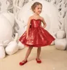 輝く赤いスパンの小さな女の子のページェントのドレスの取り外し可能なチュール列車ボールガウンの高い低い子供のクリスマスの誕生日パーティーガウン