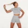 2020 Женская Йога Set Бесшовные Sportswear 2 шт Набор Quick Dry Короткие рукава рубашки пот кадрирования верхней и шорты для бега Йога Tracksuit