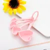 Heart Shaped Измерение Ложки Свадебный подарок сувенир Baby Shower Party Favor подарки Кухня Выпечка Пластиковые Measurring Ложки Подарки