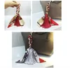 Spring and summer leather silk scarf tassel pendant ladies fashion creative bag accessories key chain key ring pendant