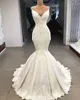 Robes de mariée sirène en dentelle élégante Spaghetti dos nu plage robe de mariée Satin balayage train robes de mariée pas cher sur mesure