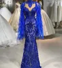 Koningsblauwe kant zeemeermin prom jurken veer lange mouwen hoge nek avondjurken vloer lengte formele feestjurk
