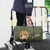 Bolso de diseñador Bolsos y bolsos de mano de viaje de tigre bordado bandolera de hombro organizador de viaje de lujo marca Sports leisur bag