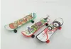 Mini skateboard di dita pattinaggio Creative Punta di dito del movimenti in plastica liscia giocattoli per bambini per bambini DC520