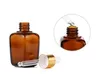 Bouteille d'huile essentielle en verre ambré et flacons compte-gouttes carrés liquides 10 ml 20 ml 30 ml bouchons de type multiple