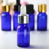 Blaue E-Liquid-Tropfflaschen aus Glas 30 ml mit goldsilbernen schwarzen Deckeln für kosmetische ätherische Öle und Aromatherapie