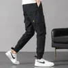 Brzoskwiniowa skóra aksamitna cienkie przystojne multi-kieszeni męskie spodnie 2020 Nowe męskie kombinezony Khaki Duży rozmiar Spodnie robocze Męskie Spodnie Cargo